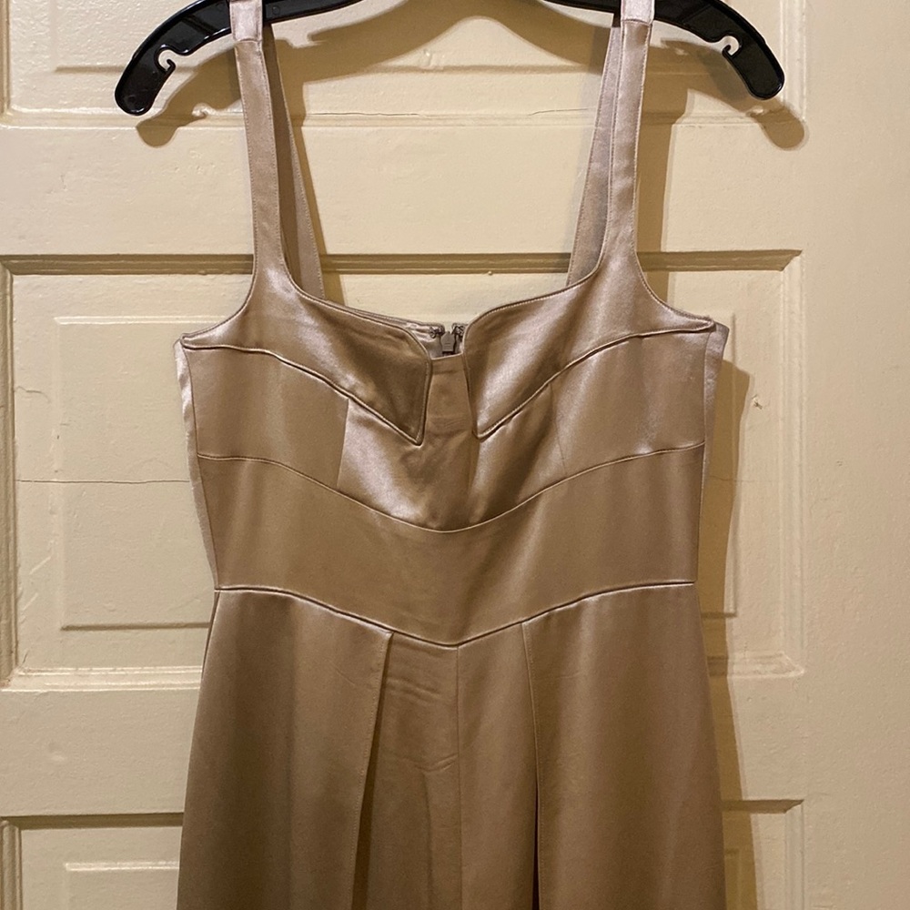 Full length, wide leg, champagne colored formal jumpsuit by Mestiza.